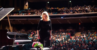 Mona at the Piano. The Children of Willesden Lane. Image Provided by The Jewish Federation of Omaha.
