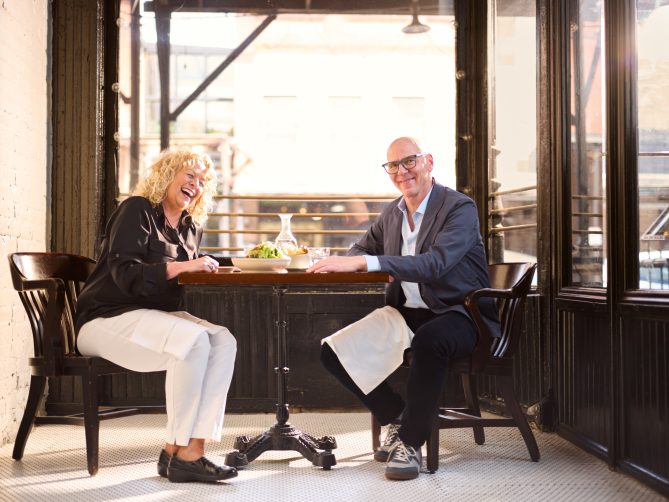 Jeff and Diane laughing at restaurant