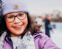 Tegan Hess in coat and hat