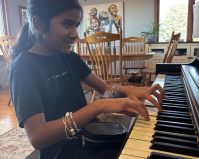 Pooja Ruwe playing a piano