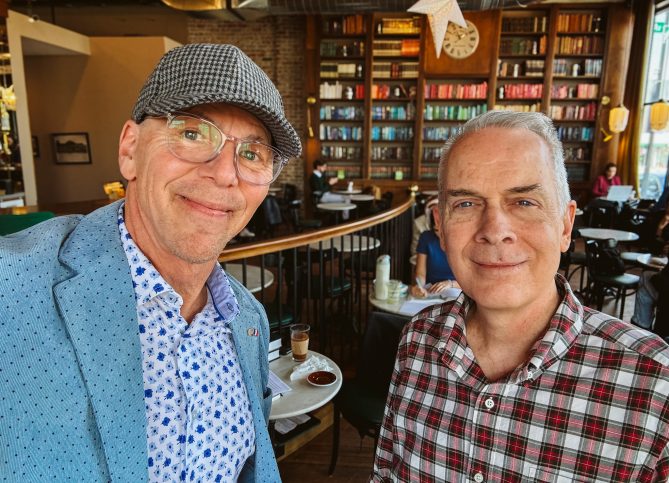 Jeff Koterba and Bob Atherton smile for a selfie at The Mill.