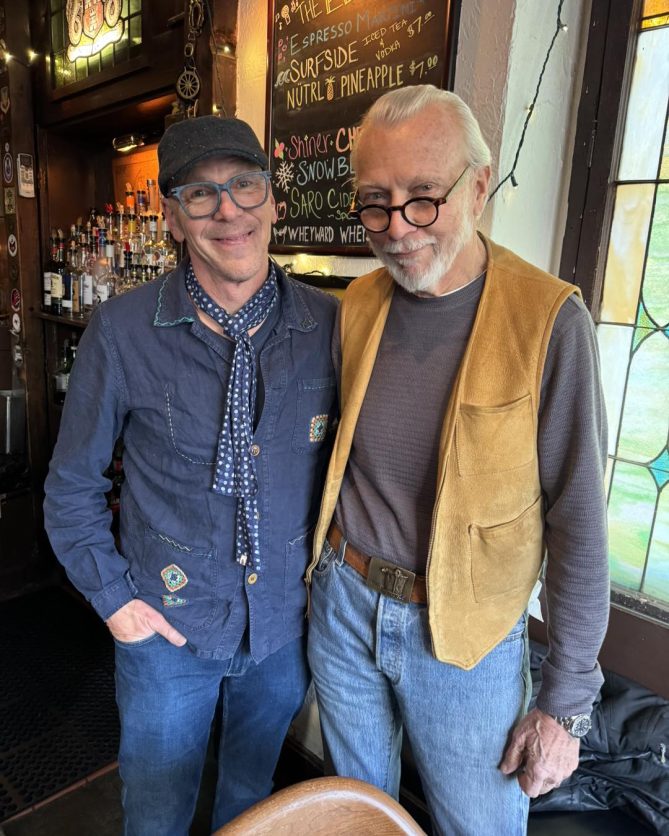 Jeff Koterba and Roger Durand pose together for a photo