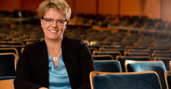Jennifer Boomgaarden, Executive Director of the Omaha Symphony, posing confidently with a warm smile.