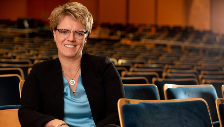Jennifer Boomgaarden, Executive Director of the Omaha Symphony, posing confidently with a warm smile.