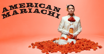 The character Lucha sits peacefully in a vibrant bed of flowers, surrounded by colorful blooms, with the text “American Mariachi” above her.