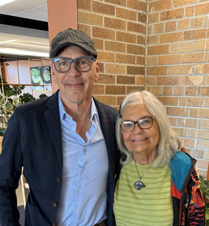 Jeff Koterba smiles with Maureen Toberer Mangan