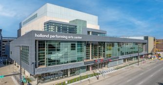 Exterior view of the Holland Center on a bright day, photographed by Tom Kessler.