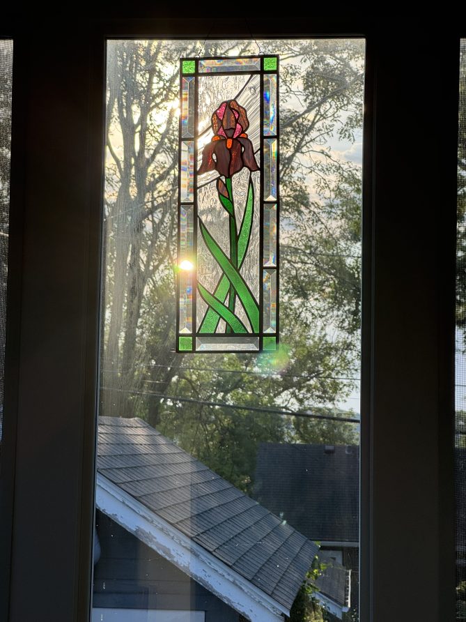 The light shining through a stained glass window created by Becky Lowe's mom, Julee. 