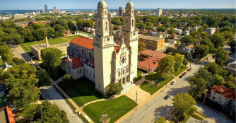 Aerial view of St. Cecilia Cathedral in Omaha, showing its distinctive architecture and surrounding grounds