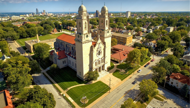 Aerial view of St. Cecilia Cathedral in Omaha, showing its distinctive architecture and surrounding grounds
