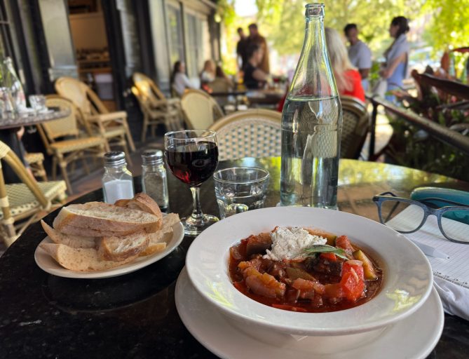 Photo of ratatouille and wine at La Buvette.