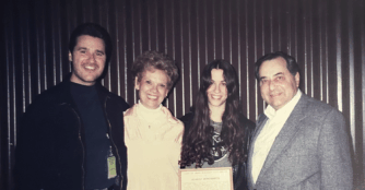 From left to right, Terry Anzaldo, Janice Anzaldo, Alanis Morissette, and Subby Anzaldo pose together, smiling for the camera.