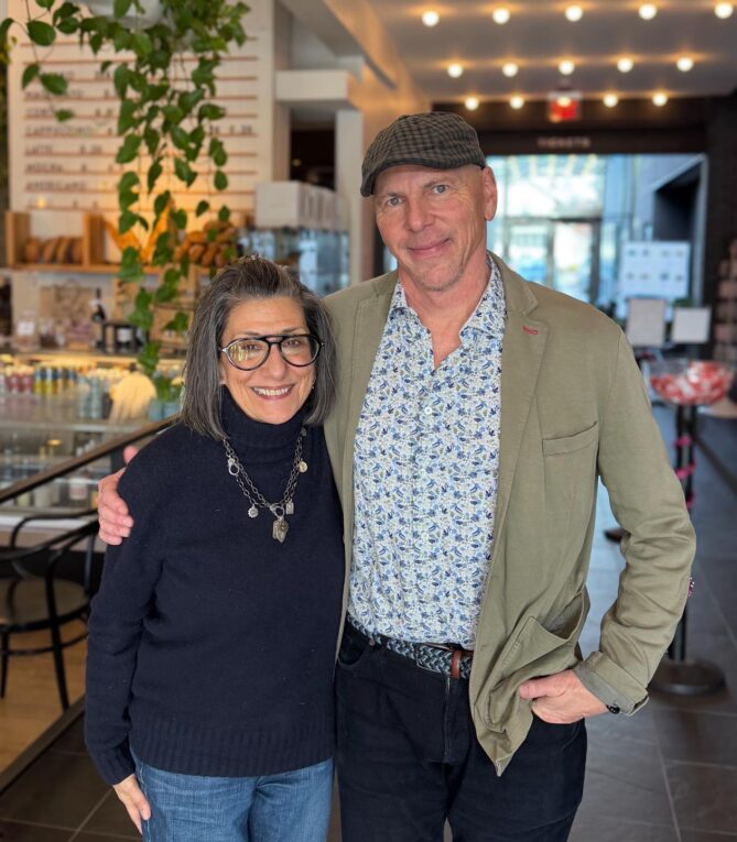 Jeff and Mary Jo Pane standing together smiling at Lola's 