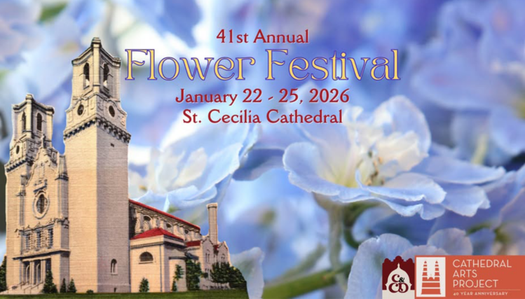 The front of the Omaha cathedral is seen beneath a blue sky filled with colorful flowers.