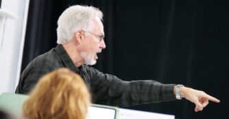 Opera conductor Steven White rehearses musicians during preparations for Opera Omaha’s upcoming production of Susannah. Title