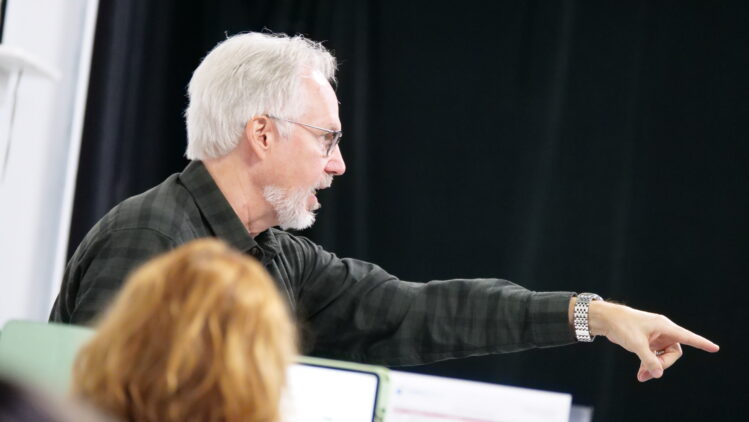 Opera conductor Steven White rehearses musicians during preparations for Opera Omaha’s upcoming production of Susannah. Title
