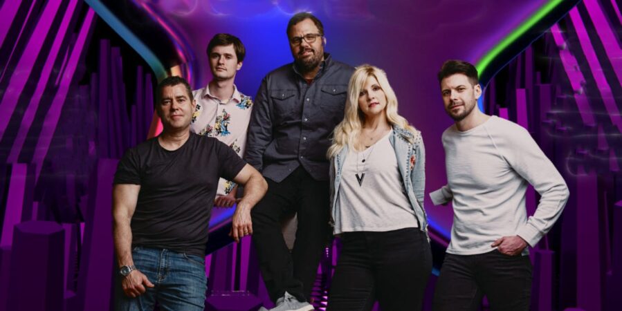 Promotional photo of Ecko band members posing for Outdoor Concerts at the Oasis event.