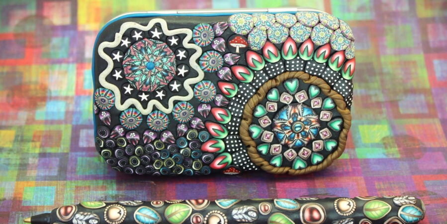 Colorful art done on a chunk of clay.