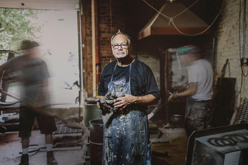 A man in an artworks shop